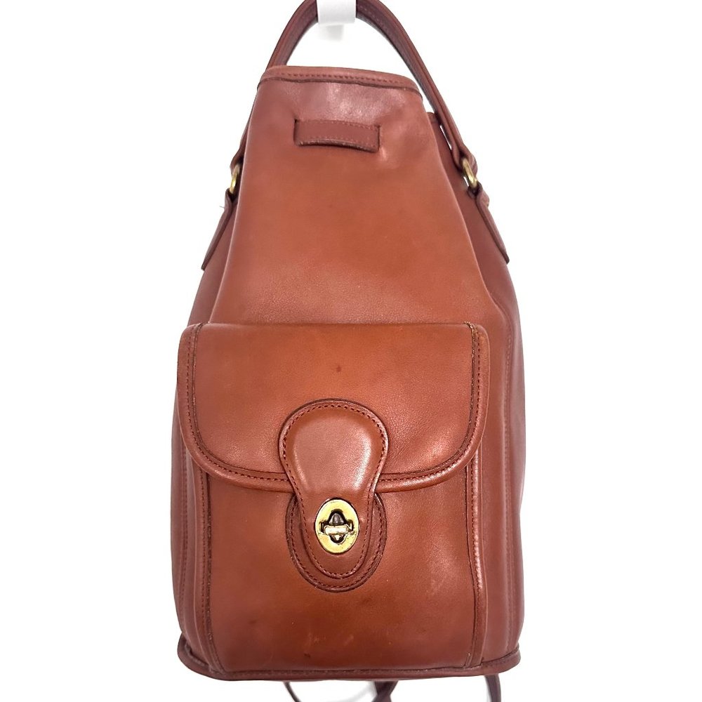 Vintage coach, leather cylinder sling / backpack, EUC